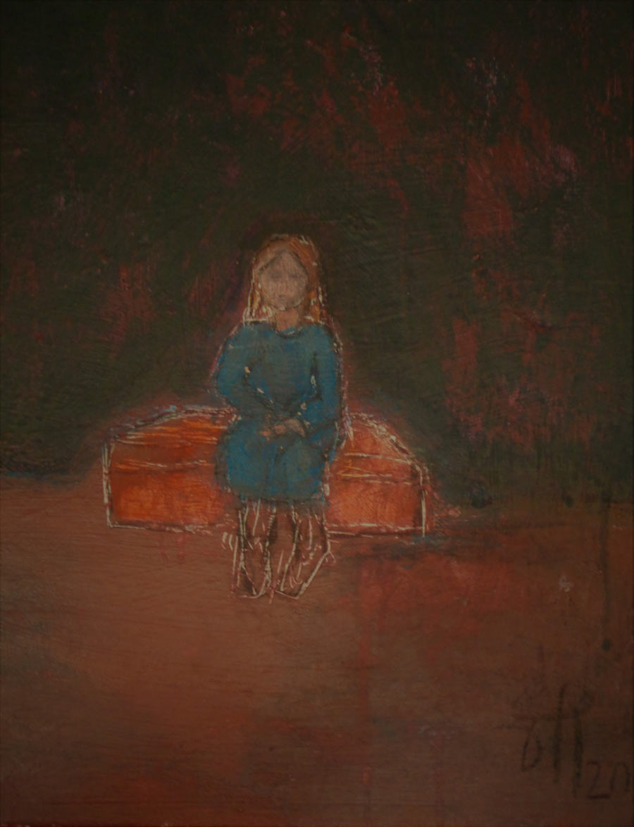 Kind auf rotem Koffer